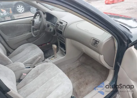 1999 Toyota Corolla Le из США, поврежденный, VIN 2T1BR12E4XC124432